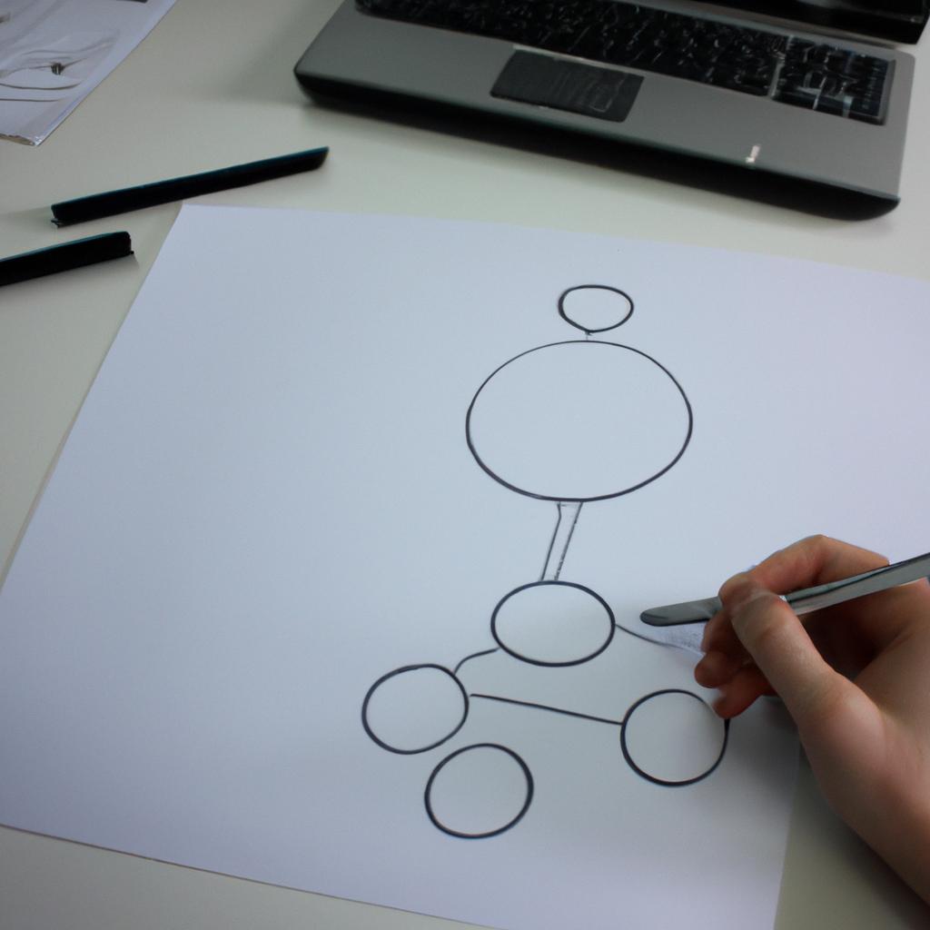 Person working on network diagram